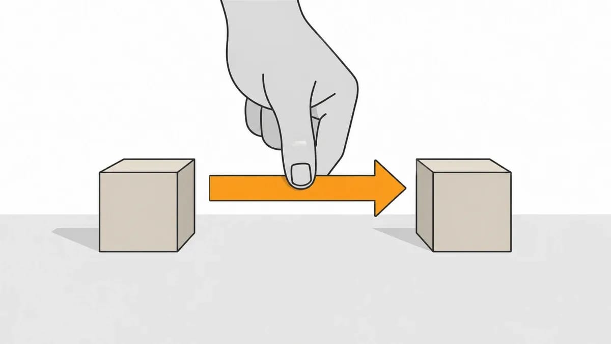 A hand placing a paper arrow that points from one wooden block to another